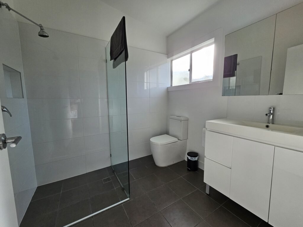 clean and tidy shower and bathroom