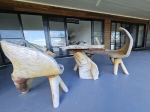 creative wood sculptured table and chairs