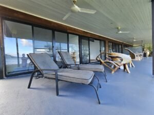 loungers on the veranda for soaking up the sun and views